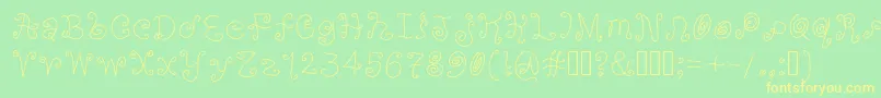 フォントOrange ffy – 黄色の文字が緑の背景にあります