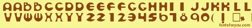 フォントEsmondRegular – 茶色の文字が黄色の背景にあります。