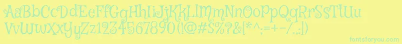 MysteryquestRegular Font – Green Fonts on Yellow Background