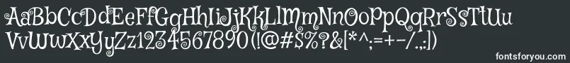 フォントMysteryquestRegular – 黒い背景に白い文字