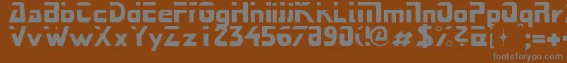 Nextstar-fontti – harmaat kirjasimet ruskealla taustalla