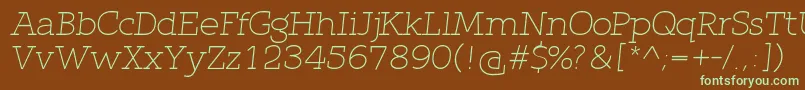 QlarendonLightItalic-fontti – vihreät fontit ruskealla taustalla