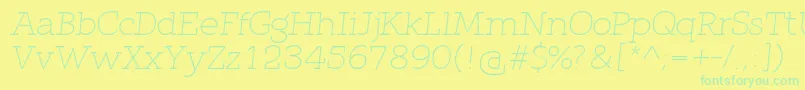 QlarendonLightItalic-Schriftart – Grüne Schriften auf gelbem Hintergrund