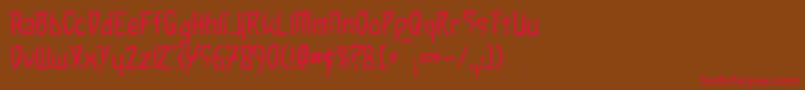 フォントTaibaijan – 赤い文字が茶色の背景にあります。
