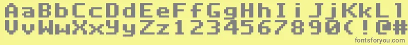 フォントDlxfont – 黄色の背景に灰色の文字