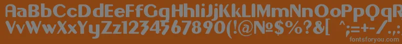 Gilgon-Schriftart – Graue Schriften auf braunem Hintergrund