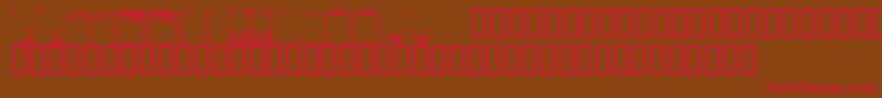 フォントKrHolidayFrames1 – 赤い文字が茶色の背景にあります。