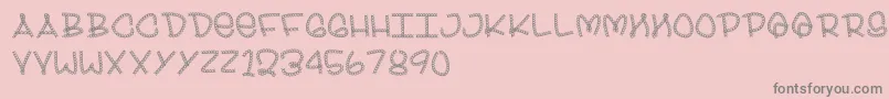 Bling-fontti – harmaat kirjasimet vaaleanpunaisella taustalla