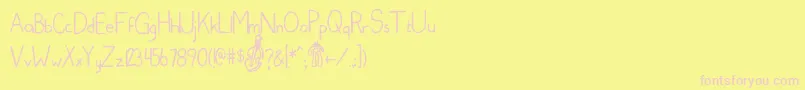Edcom Font – Pink Fonts on Yellow Background