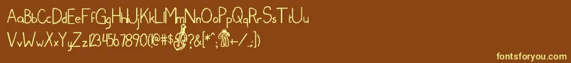 Edcom Font – Yellow Fonts on Brown Background