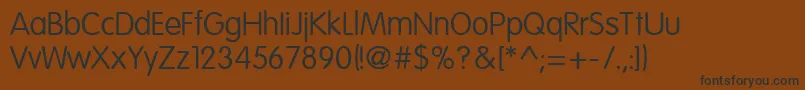EsfRoundedNormal Font – Black Fonts on Brown Background