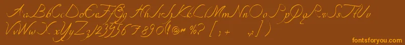 Czcionka TipografiaNuevaCursivass – pomarańczowe czcionki na brązowym tle
