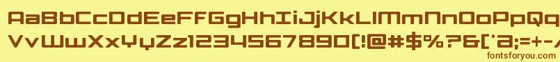 フォントPhoenicialowercasecond – 茶色の文字が黄色の背景にあります。