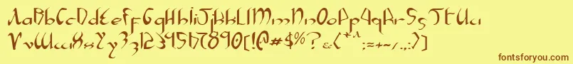 フォントXaphane – 茶色の文字が黄色の背景にあります。