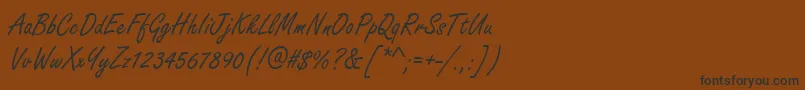 HandmadescriptRegular-Schriftart – Schwarze Schriften auf braunem Hintergrund