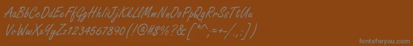 Шрифт HandmadescriptRegular – серые шрифты на коричневом фоне