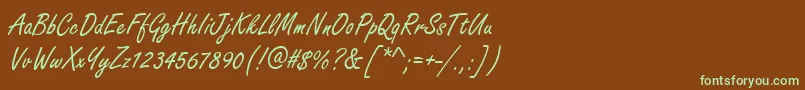 フォントHandmadescriptRegular – 緑色の文字が茶色の背景にあります。