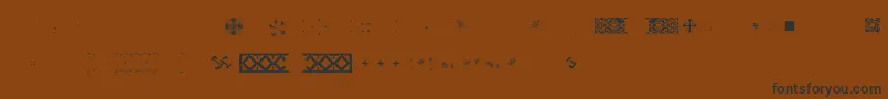 Czcionka Pfornmtreasures2Layer5 – czarne czcionki na brązowym tle