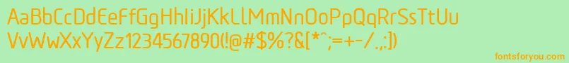 フォントTadaoMedium – オレンジの文字が緑の背景にあります。