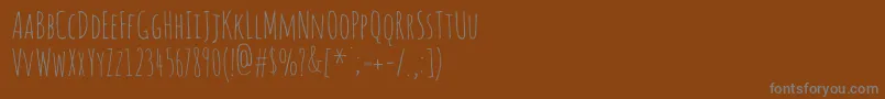 フォントAmaticsc – 茶色の背景に灰色の文字