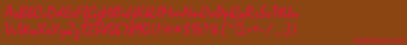 フォントMysticaldbNormal – 赤い文字が茶色の背景にあります。