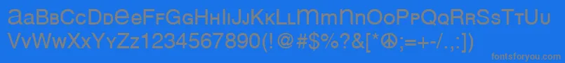 Mean26Sans-Schriftart – Graue Schriften auf blauem Hintergrund