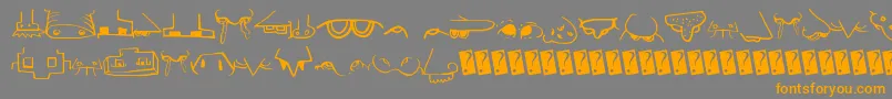 フォントCreaturebuildernose – オレンジの文字は灰色の背景にあります。