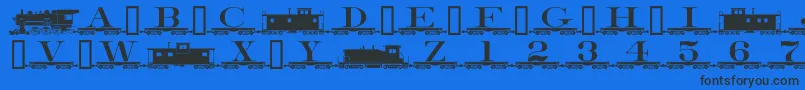 Czcionka Alphabettrain – czarne czcionki na niebieskim tle