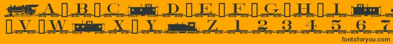 Czcionka Alphabettrain – czarne czcionki na pomarańczowym tle