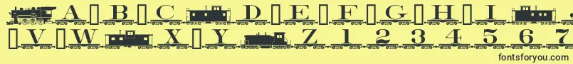 Czcionka Alphabettrain – czarne czcionki na żółtym tle