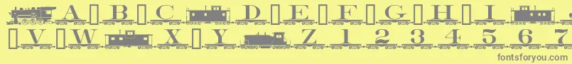 More about Alphabettrain Font Alphabettrain Font – Gray Fonts on Yellow Background