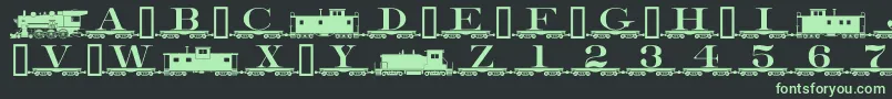 Czcionka Alphabettrain – zielone czcionki na czarnym tle