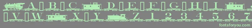 Alphabettrain Font – Green Fonts on Gray Background