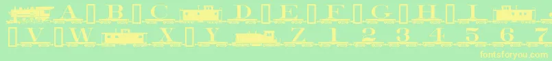 Alphabettrain Font – Yellow Fonts on Green Background