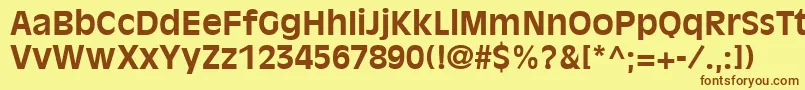 AntiqueOliveLtBold-fontti – ruskeat fontit keltaisella taustalla