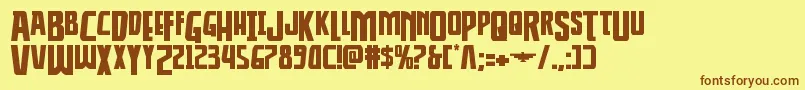 フォントThunderhawkdropexpand – 茶色の文字が黄色の背景にあります。