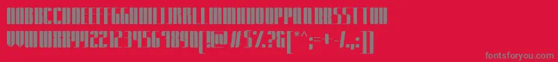 フォントExpatriatePromo – 赤い背景に灰色の文字