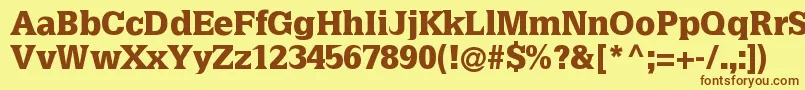 フォントLatiniablack – 茶色の文字が黄色の背景にあります。