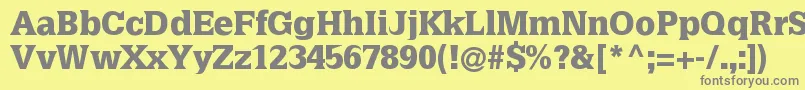 フォントLatiniablack – 黄色の背景に灰色の文字