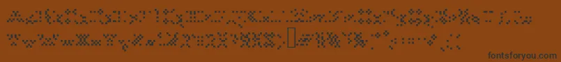 Tourdeforcealias Font – Black Fonts on Brown Background