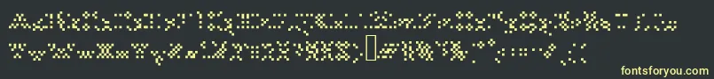 フォントTourdeforcealias – 黒い背景に黄色の文字