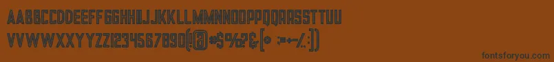 フォントTronboldinline – 黒い文字が茶色の背景にあります