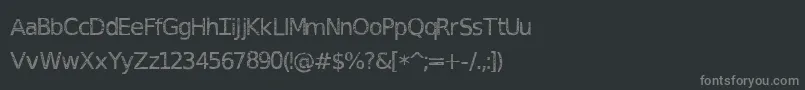 Fonte DeusEtchedMachina – fontes cinzas em um fundo preto