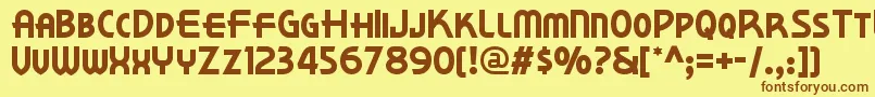 フォントKornerdelinf – 茶色の文字が黄色の背景にあります。