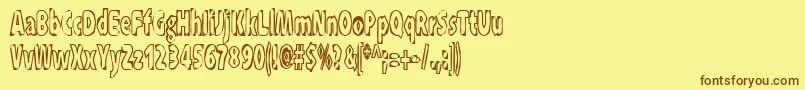 Xraytid-Schriftart – Braune Schriften auf gelbem Hintergrund