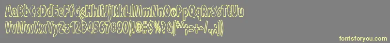 Xraytid Font – Yellow Fonts on Gray Background