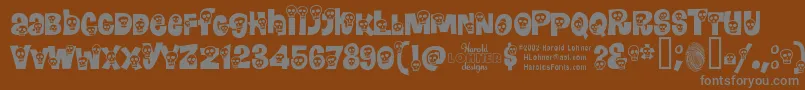 Calavera-Schriftart – Graue Schriften auf braunem Hintergrund