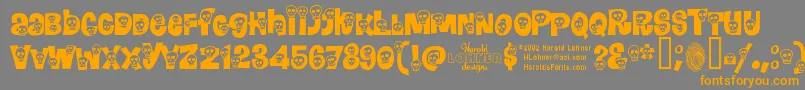 フォントCalavera – オレンジの文字は灰色の背景にあります。