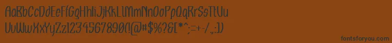 Więcej informacji o czcionce Komikaze Czcionka Komikaze – czarne czcionki na brązowym tle