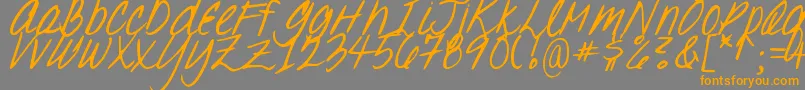 DjbOhSuzannah-Schriftart – Orangefarbene Schriften auf grauem Hintergrund